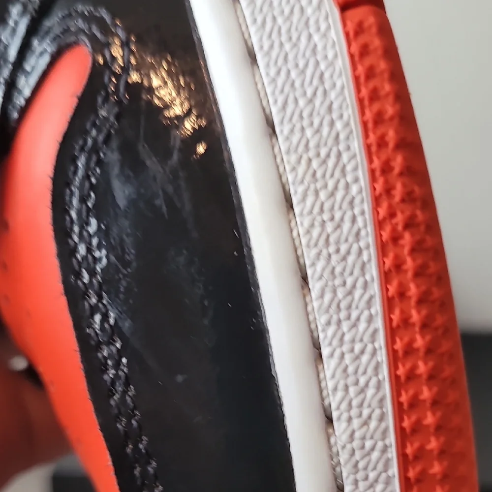 Air Jordan 1 Low Kids Black and Orange Sneakers